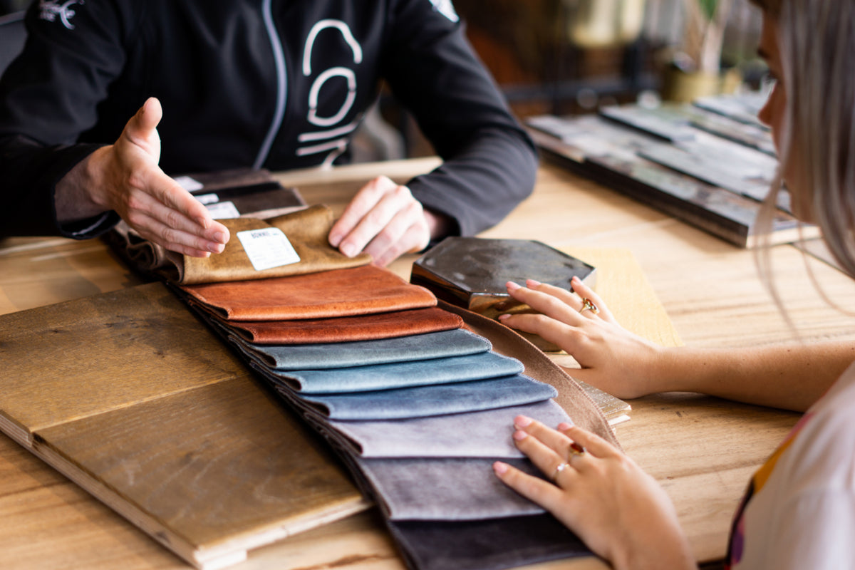 Fabric samples on a table in the Colmore showroom